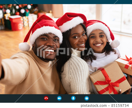 Screenshot Of African Family Video Calling Celebrating Christmas At Home Screenshot Of African Family Video Calling Celebrating Christmas At Home 85159734