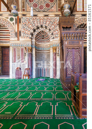 Marble wall with engraved Mihrab, and wooden Minbar, at Mamluk era Mosque of Sultan al Muayyad, Old Cairo, Egypt 85161571