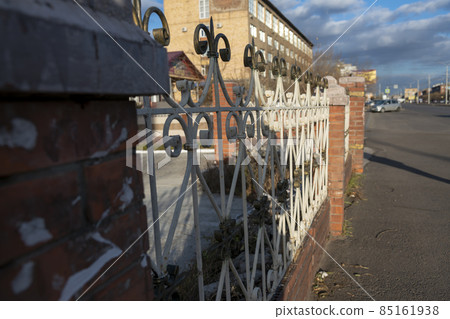 White painted metal fence with bronze tips. 85161938