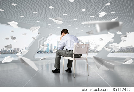 young businessman on chair in office 85162492