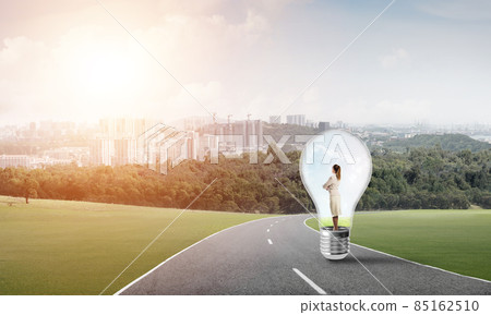 Businesswoman inside light bulb 85162510