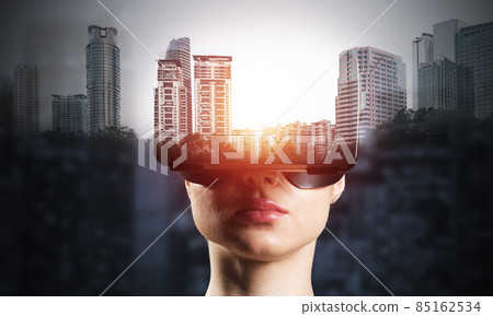 Young woman in VR goggles 85162534