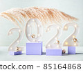 New year 2022 numbers with pampas branch on purple podiums 85164868