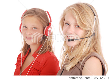 Beautiful customer service operator student girl with headset Beautiful customer service operator student girl with headset 85165294