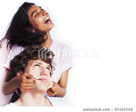 best friends teenage girl and boy together having fun, posing emotional on white background, couple happy smiling, lifestyle people concept, blond and brunette multi nations best friends teenage girl and boy together having fun, posing emotional on white background, couple happy smiling, lifestyle people concept, blond and brunette multi nations 85165508