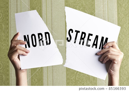 Plastic straws on Russian and German national flags. Nord Stream gas pipeline, sanctions and politics. Russia Vs Germany. Torn paper. Plastic straws on Russian and German national flags. Nord Stream gas pipeline, sanctions and politics. Russia Vs Germany. Torn paper. 85166393