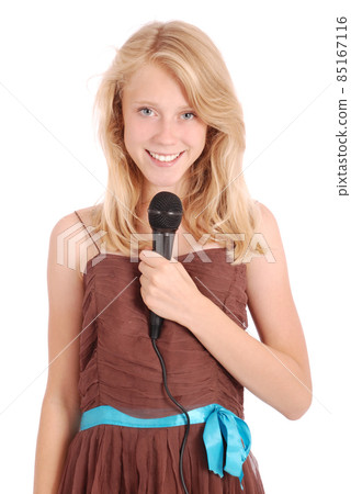 Happy young beautiful girl singing with microphone 85167116