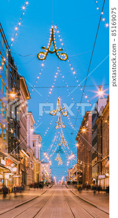 Helsinki, Finland. Night View Of Aleksanterinkatu Street With Railroad In Kluuvi District In Evening Christmas Xmas New Year Festive Illumination 85169075