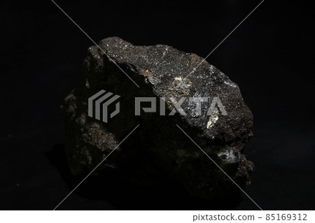 Gold ore on a black background 85169312