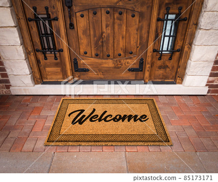 Welcome Mat At Custom Front Door Of House. Welcome Mat At Custom Front Door Of House. 85173171