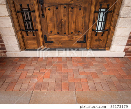 Emtpy Front Porch of House In Front of Custom Front Door. Emtpy Front Porch of House In Front of Custom Front Door. 85173179