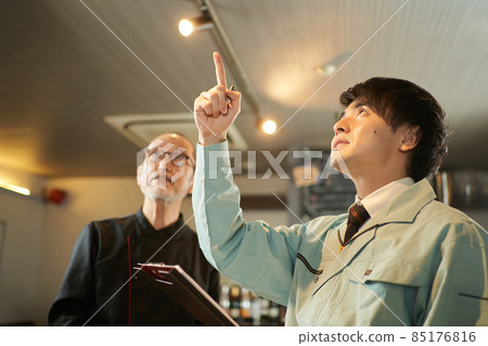 Asian man inspecting restaurant equipment Asian man inspecting restaurant equipment 85176816