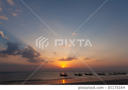 Lanscape of longtail boat in evening time with sunray beam 85178164