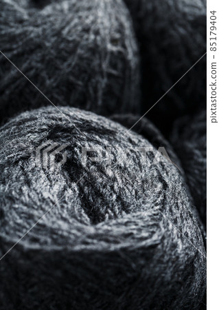 Tangles of gray yarn made of natural wool close-up Tangles of gray yarn made of natural wool close-up 85179404