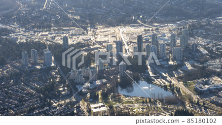 Aerial View of Coquitlam Centre Mall during a sunny winter evening 85180102