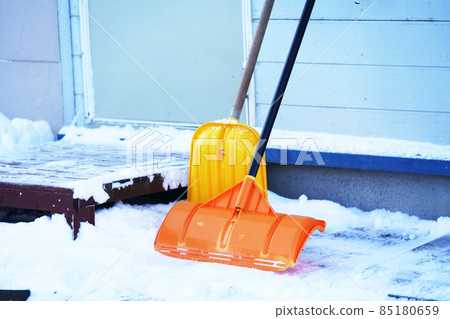 Snow shoveling tools after snow removal 85180659