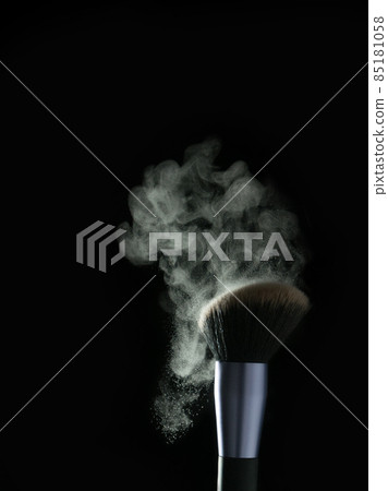 Makeup brush full of powder on black background Makeup brush full of powder on black background 85181058