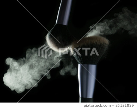 Makeup brushes' touch on black background Makeup brushes' touch on black background 85181059