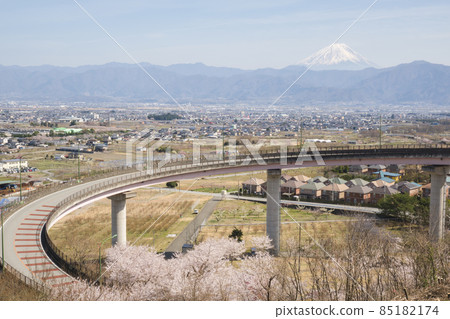 Mt. Fuji under the blue sky seen from the spring satoyama where the cherry blossoms bloom Mt. Fuji under the blue sky seen from the spring satoyama where the cherry blossoms bloom 85182174