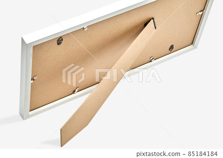 Back side of photo frame isolated on white background. Cardboard, plastic. Close up, copy space for your text or images Back side of photo frame isolated on white background. Cardboard, plastic. Close up, copy space for your text or images 85184184