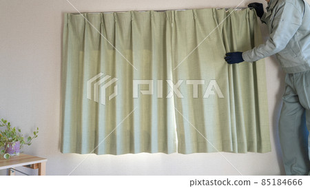 Workers installing curtains. 85184666