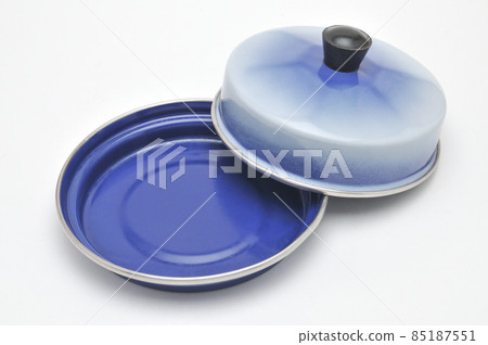 Blue enamelled metal dish for butter on white background 85187551