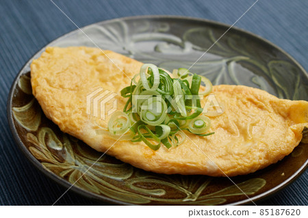 Delicious omelet with green onions Delicious omelet with green onions 85187620