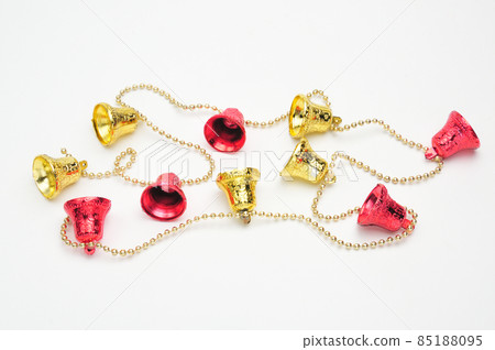 Christmas bells of red and gold color with a chain on a white background 85188095