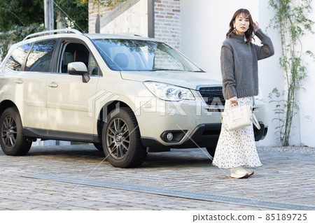 Female going out by car 85189725