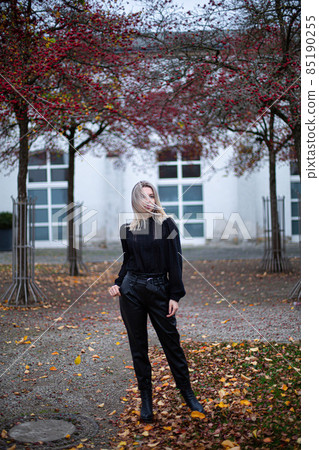 White young european woman with building behind 85190255