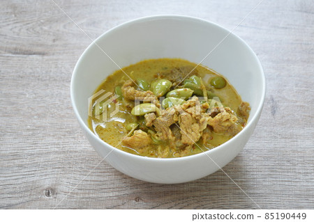 spicy boiled pork and  Nitta tree seed or luk rieng in coconut milk curry soup Thai southern food on bowl 85190449