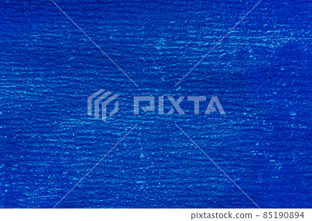 Old roofing felt material on the roof cover bitumen blue surface rough texture grunge background 85190894