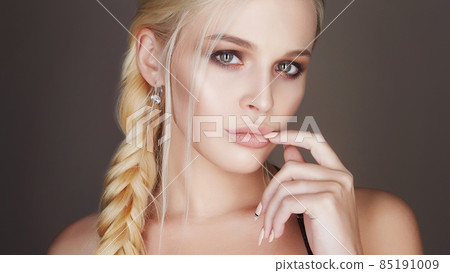 beautiful young woman with braided hair beautiful young woman with braided hair 85191009