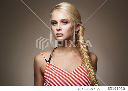 beautiful young woman with braided hair beautiful young woman with braided hair 85191010