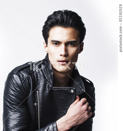 young handsome man, leather jacked on naked torso, emotional posing, white background, modern guy, lifestyle people concept young handsome man, leather jacked on naked torso, emotional posing, white background, modern guy, lifestyle people concept 85192029