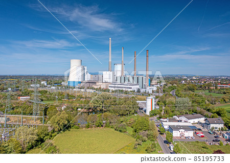 Aerial view of coal fired power plant during daytime with sunshine Aerial view of coal fired power plant during daytime with sunshine 85195733