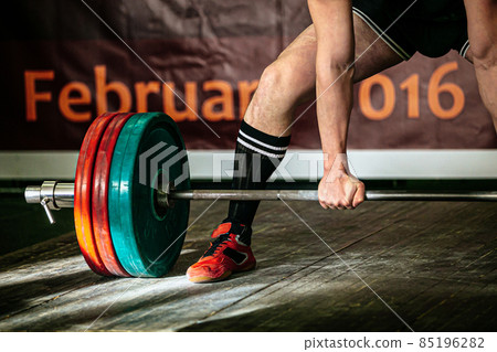 athlete exercise deadlift barbell weighing 220 kg athlete exercise deadlift barbell weighing 220 kg 85196282