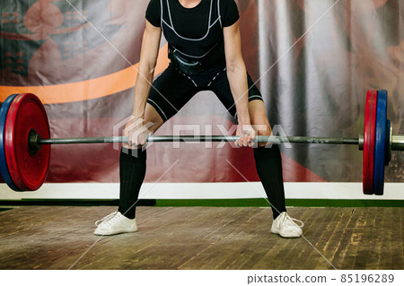 girl athlete exercise deadlift in powerlifting competition girl athlete exercise deadlift in powerlifting competition 85196289