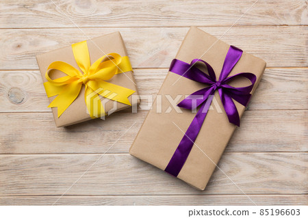 Collection of Holiday present boxes on a colored background. top view close up Collection of Holiday present boxes on a colored background. top view close up 85196603