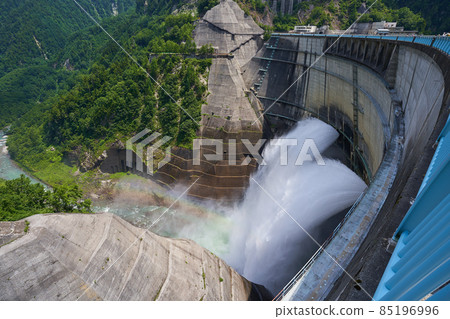 Dam water discharge and rainbow Dam water discharge and rainbow 85196996