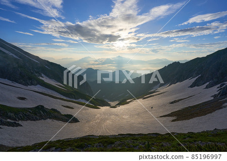 Sunrise and snowy valley of Tateyama mountain range Sunrise and snowy valley of Tateyama mountain range 85196997