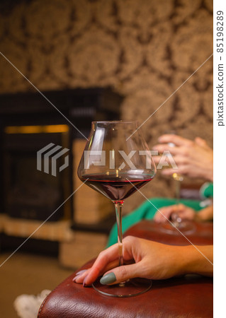 close-up of gorgeous woman with a glass of champagne. party and holiday celebration. close-up of gorgeous woman with a glass of champagne. party and holiday celebration. 85198289