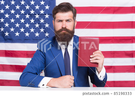Handsome lawyer man promoting american constitutional liberties, legal advice concept Handsome lawyer man promoting american constitutional liberties, legal advice concept 85198333