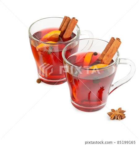 Mulled wine, orange and spices isolated on white. 85199165