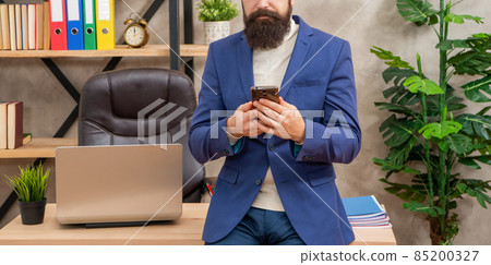 Chat directly with your customers. Man crop view chatting on smartphone. Business chat. SMS texting Chat directly with your customers. Man crop view chatting on smartphone. Business chat. SMS texting 85200327