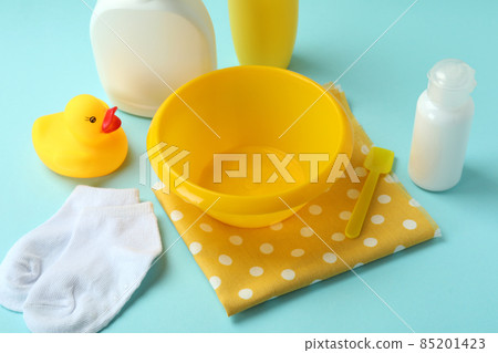Different baby hygiene accessories on blue background Different baby hygiene accessories on blue background 85201423
