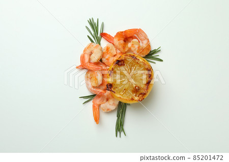 Tasty grilled shrimps and ingredients on white background Tasty grilled shrimps and ingredients on white background 85201472