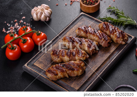 A delicious dish of pork mince wrapped with delicious pieces of bacon A delicious dish of pork mince wrapped with delicious pieces of bacon 85202020