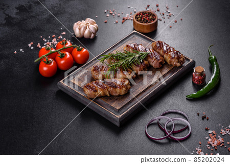 A delicious dish of pork mince wrapped with delicious pieces of bacon 85202024