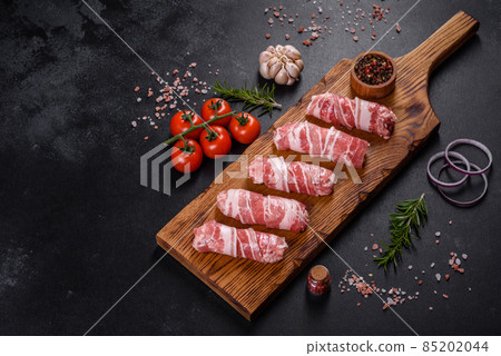 A delicious dish of pork mince wrapped with delicious pieces of bacon 85202044
